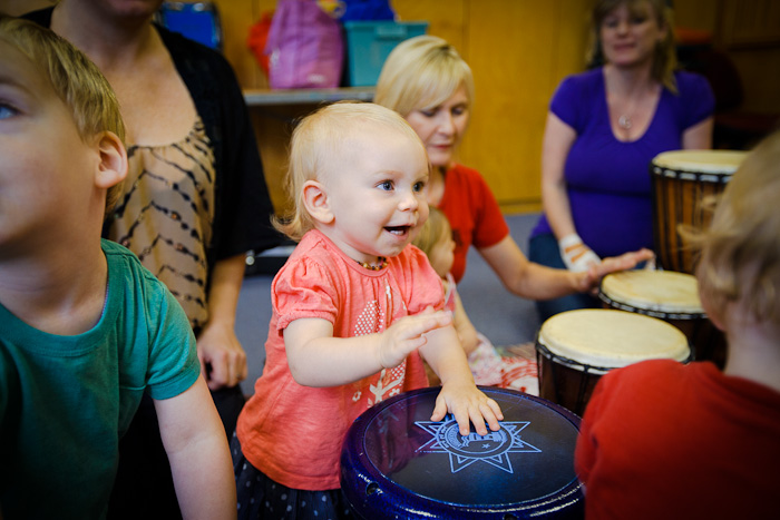 A baby beaming during an Einsteinz Music class